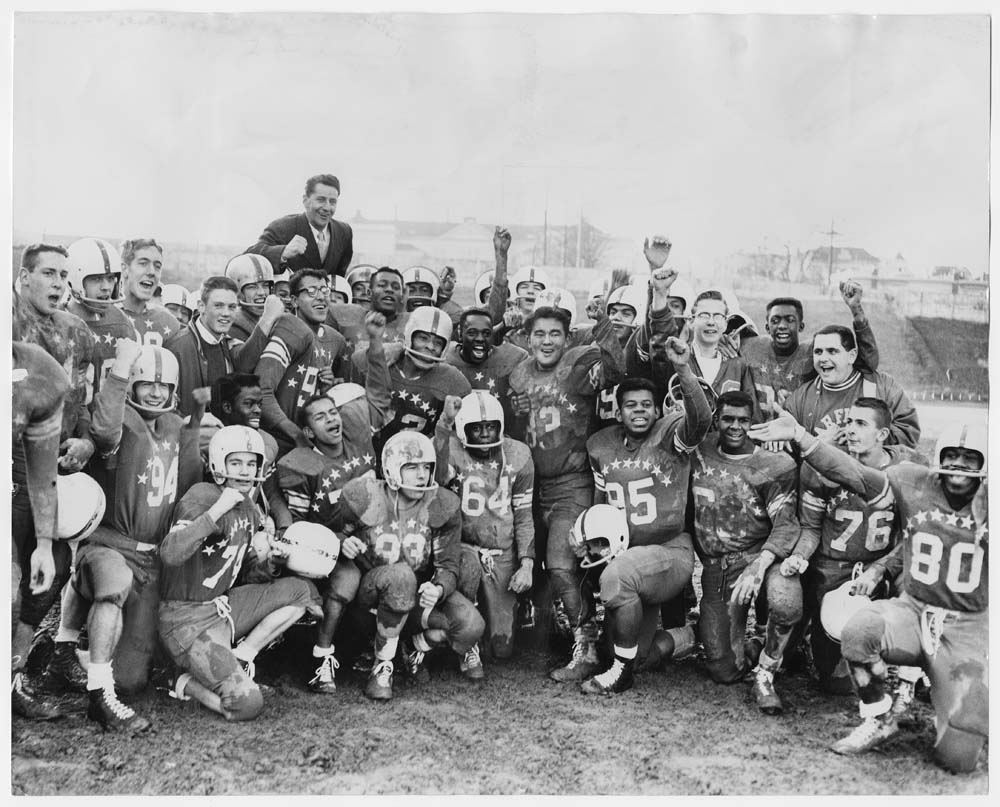 Image of Garfield High School football team after winning game, November 28, 1957