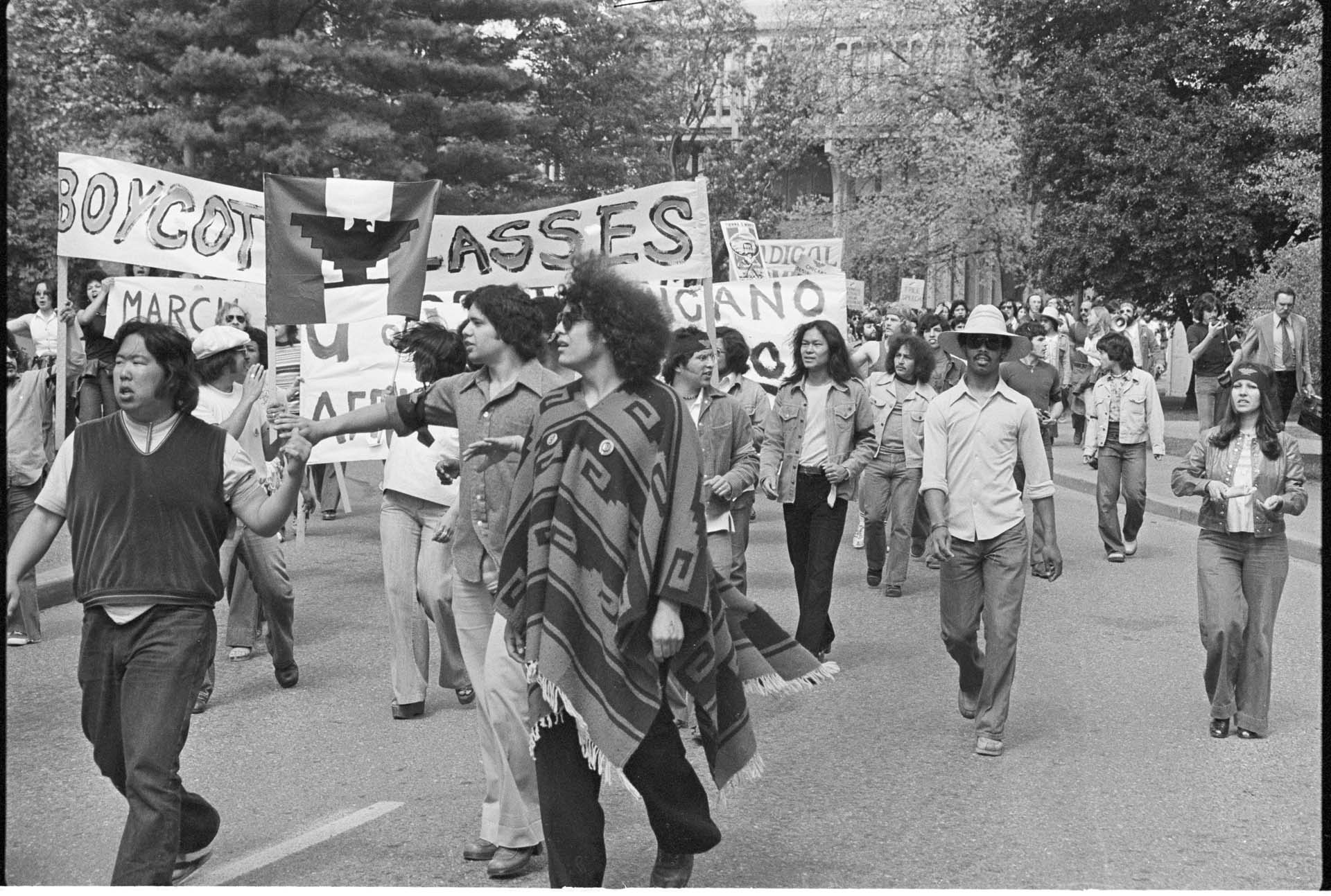 Image of UW students marching to protest Chicano staff dismissals, Seattle, May 13, 1975