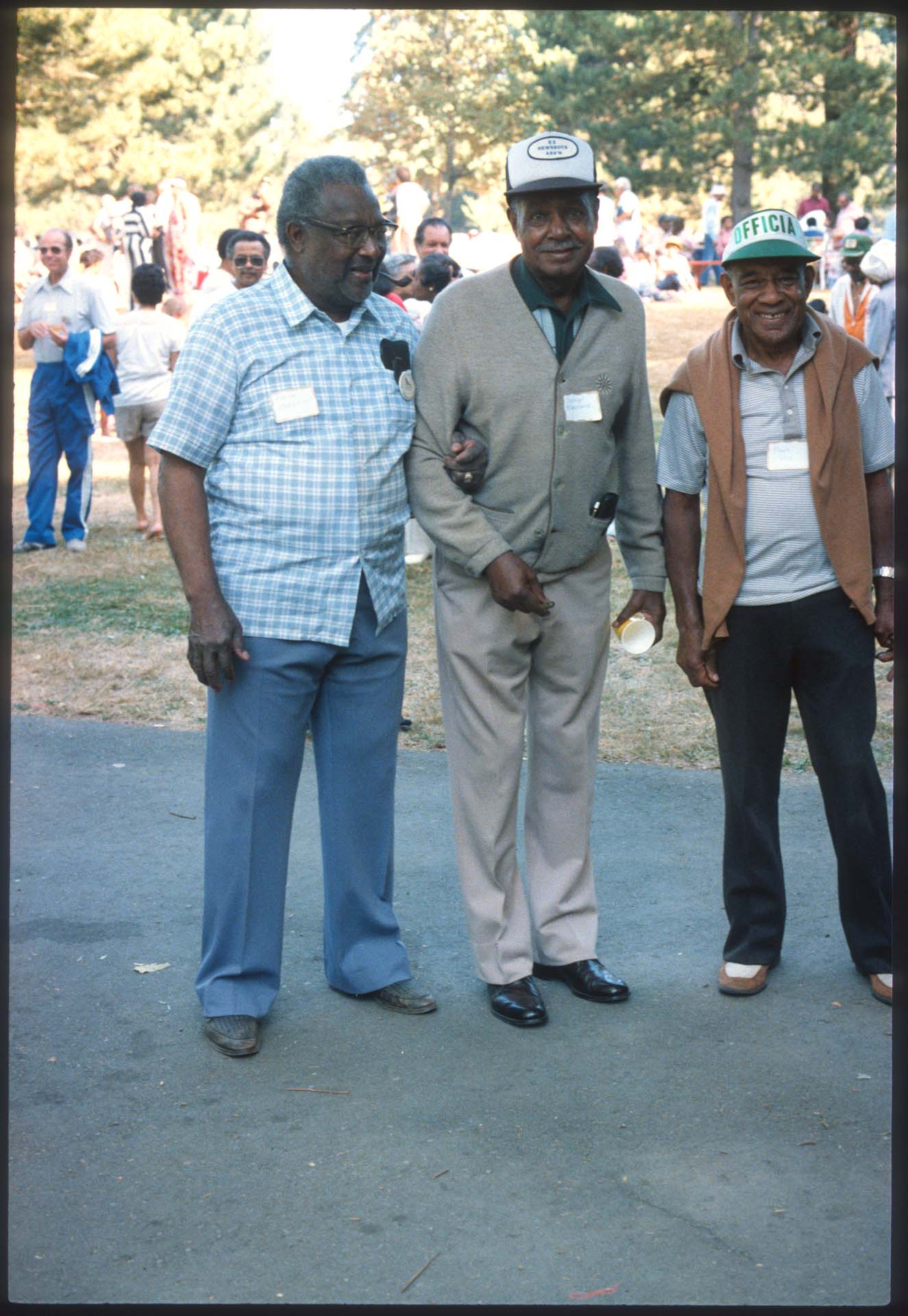 Image of Three men at ROOTS family picnic, Seattle, 1984