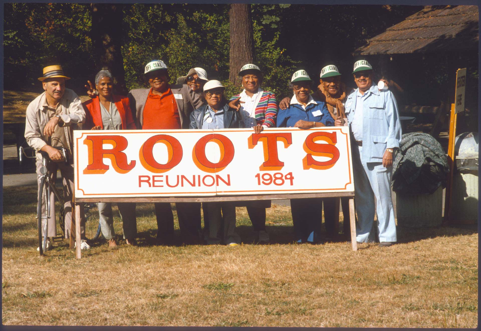 Image of Group with ROOTS Reunion sign, Seattle, 1984