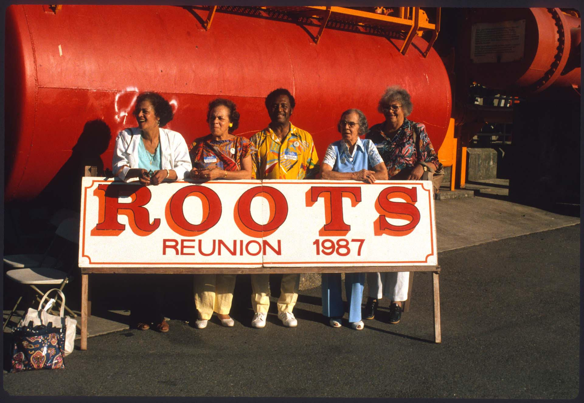 Image of Group with ROOTS Reunion sign, Seattle, 1987