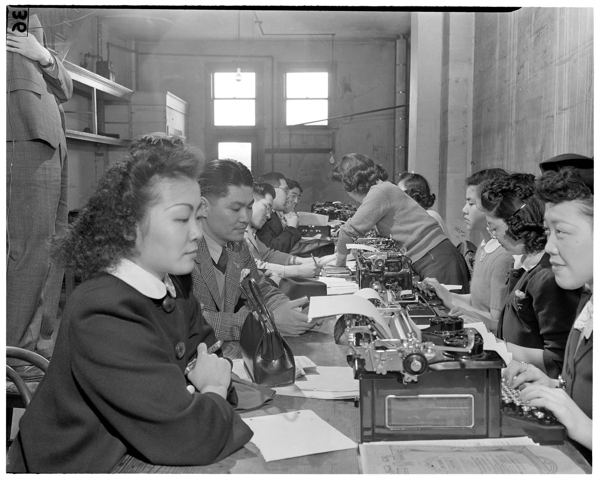 Image of Japanese Americans registering for exclusion, Seattle, 1942