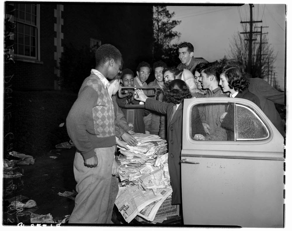 Image of Garfield students weighing donated waste paper, March 21, 1947