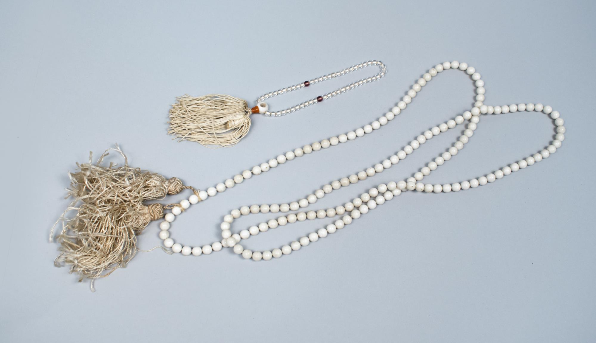 Image of Buddhist prayer beads from Sagamiya Confectionary Co., ca. 1905-1920