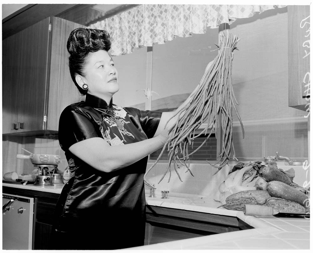 Image of Ruby Chow in the kitchen, probably in Seattle, 1960