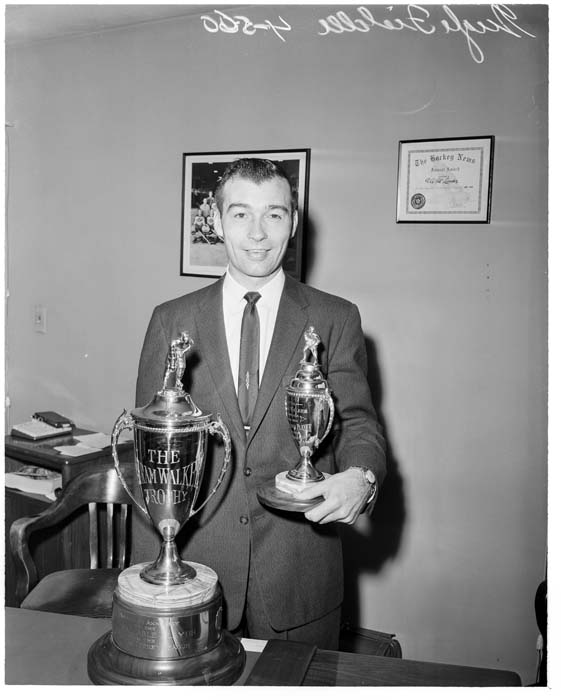 Image of Guyle Fielder with MVP trophies, Seattle, April 4, 1960