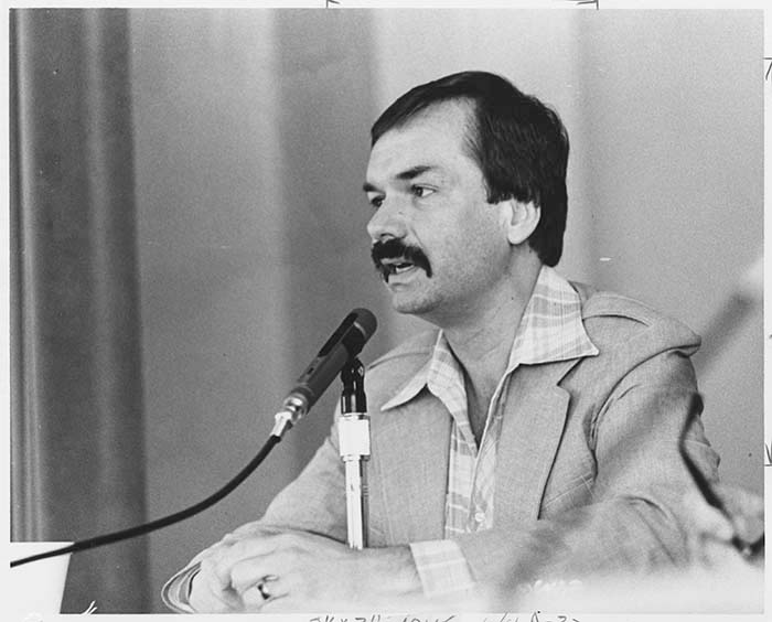 Image of Charlie Brydon speaking at debate on Initiative 13, Seattle, June 4, 1978