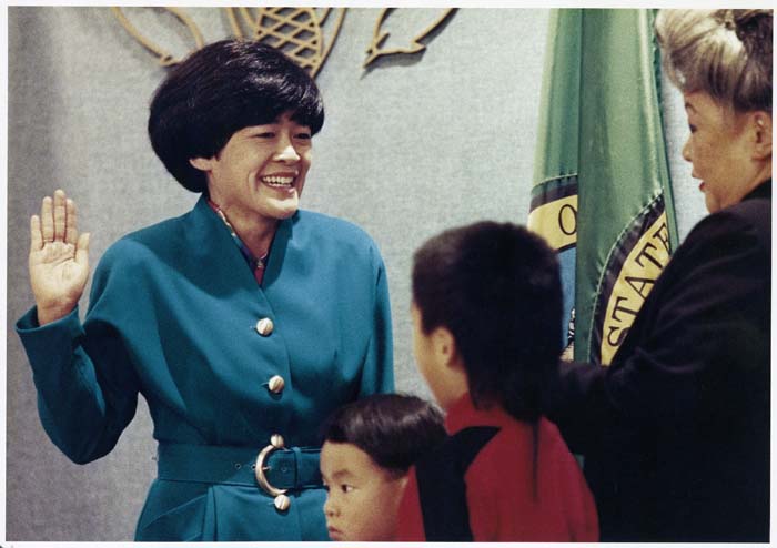 Image of Cheryl Chow taking Seattle City Council oath of office, Seattle, January 2, 1990