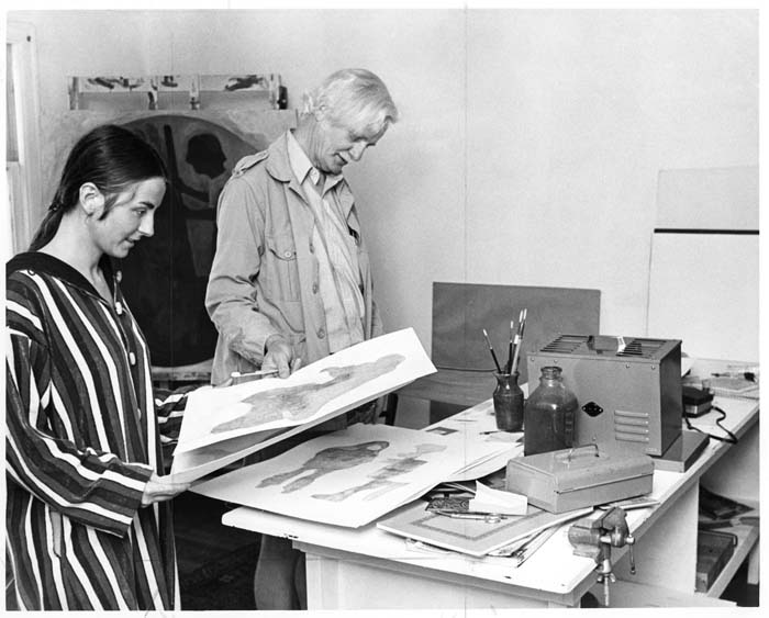 Image of William & Sue Cumming looking at art work in home studio, May 1971