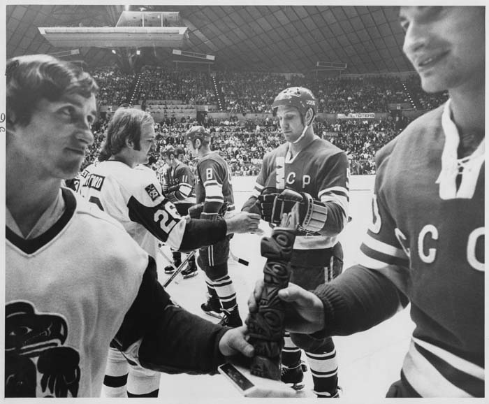 Image of Seattle Totems and Soviet hockey teams shaking hands, December 25, 1972