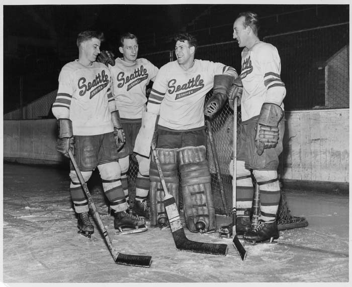 Image of Seattle Ironmen players on the ice, March 1950