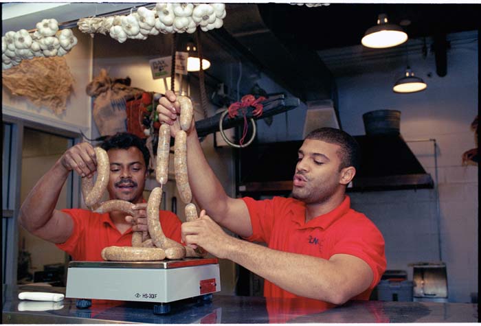 Image of Jimi and Frank Dorsey making sausages at The Incredible Link, Seattle, October 5, 1993