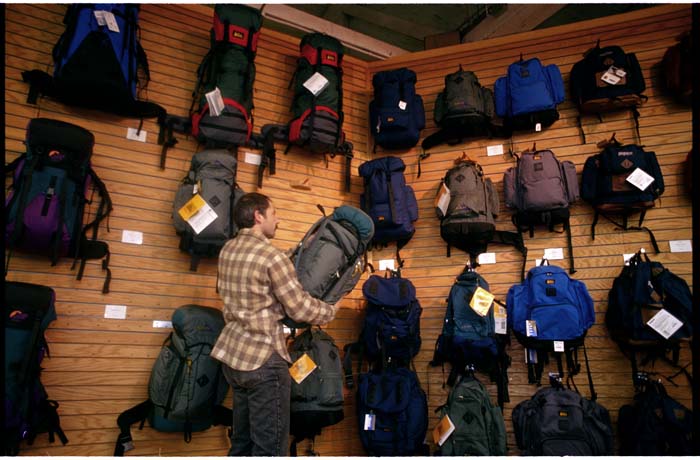 Image of Man shopping for backpack at REI, Seattle, November 12, 1993