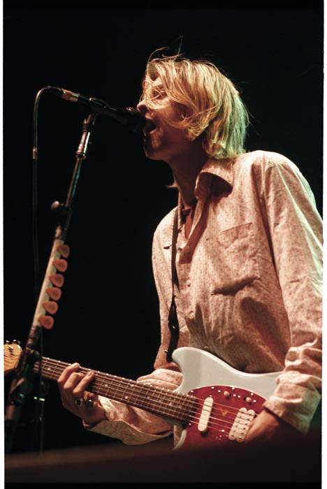 Image of Kurt Cobain on stage during Nirvana concert, Seattle Center Arena, January 7, 1994