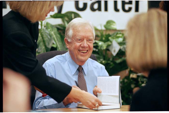 Image of Jimmy Carter signing books, Issaquah, December 19, 1996