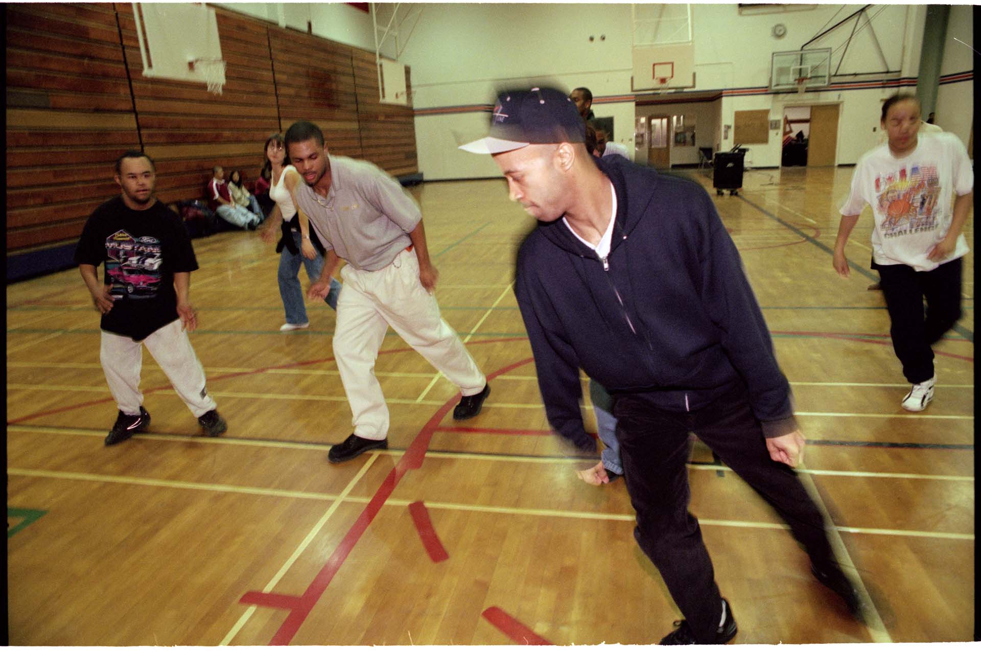 Image of Chris Daigre teaching dance to Rainier High School students, Seattle, February 20, 1997