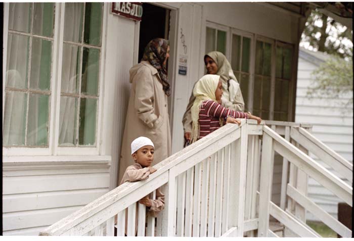 Image of Women and children on the porch of the Masjid Al-Salaam, SeaTac, August 3, 2001