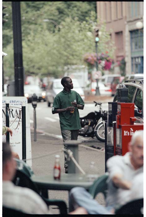 Image of William Deng walking in the Pioneer Square area, Seattle, August 2001