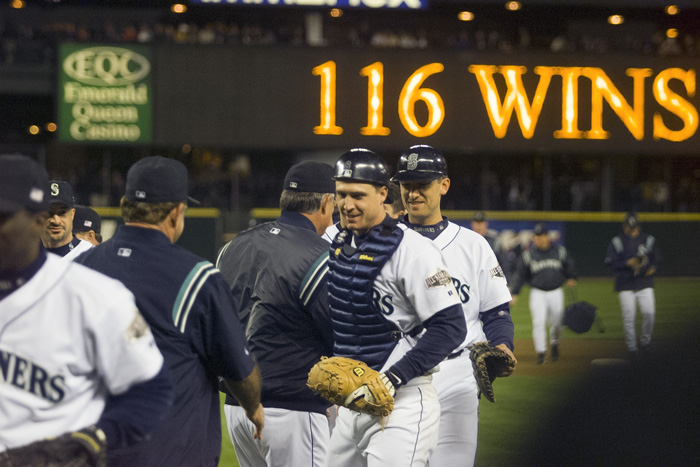 Image of Mariners players being congratulated after 116th win, Safeco Field, Seattle, October 6, 2001