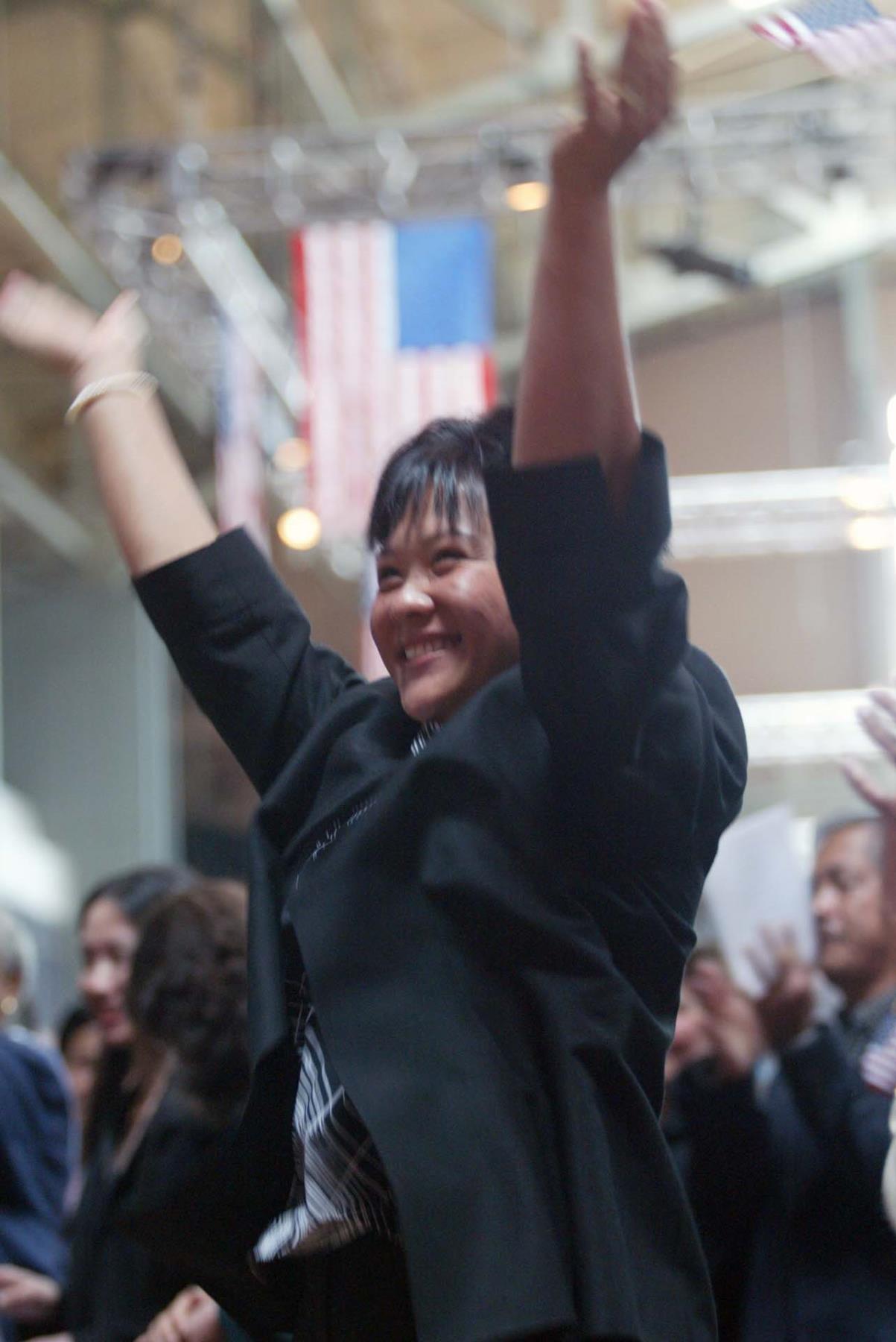 Image of Ying Shen Winkle after being sworn in as a new citizen at Seattle Center, July 4, 2002