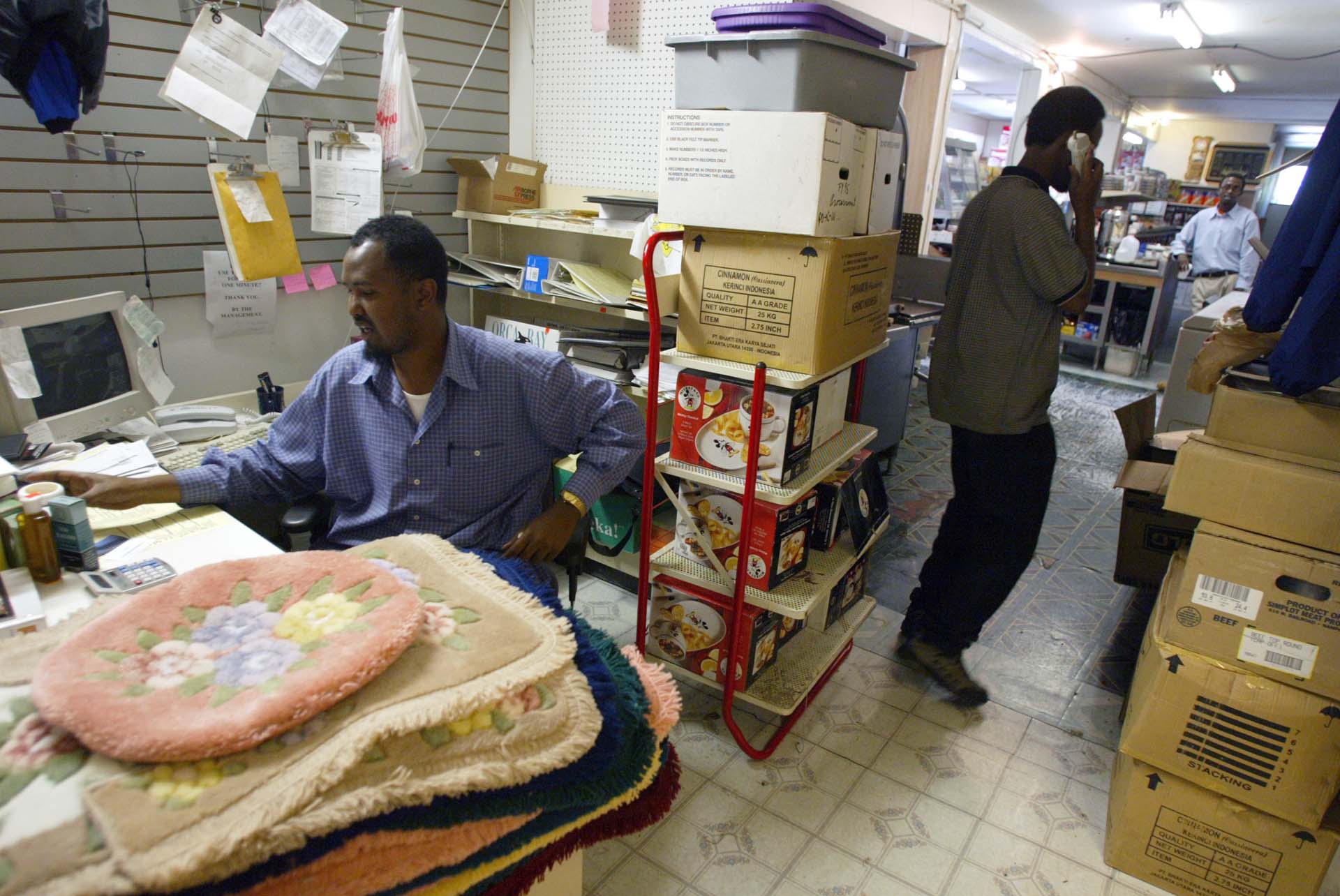 Image of Abdinasir Ali Nur at the Maka Mini Mart, Seattle, July 16, 2002