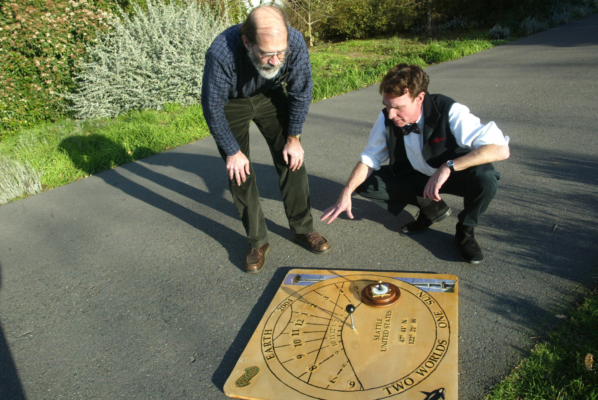 Image of Bill Nye and Woody Sullivan with EarthDial, Seattle, December 22, 2003