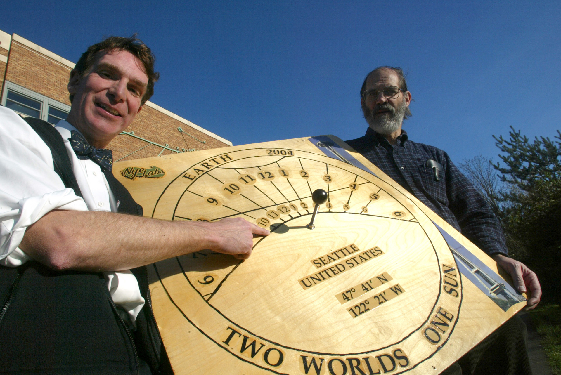 Image of Bill Nye and Woody Sullivan with EarthDial, Seattle, December 22, 2003