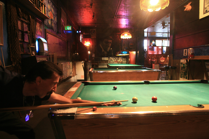 Image of Man playing pool at Eastlake Zoo Tavern, Seattle, September 23, 2007