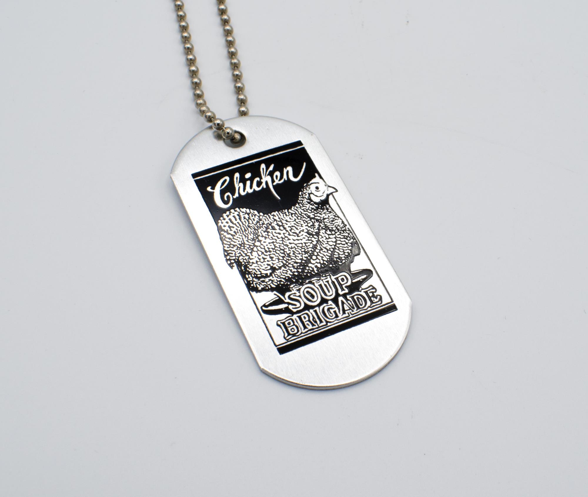 Image of Chicken Soup Brigade dog tag and chain, ca. 1990s