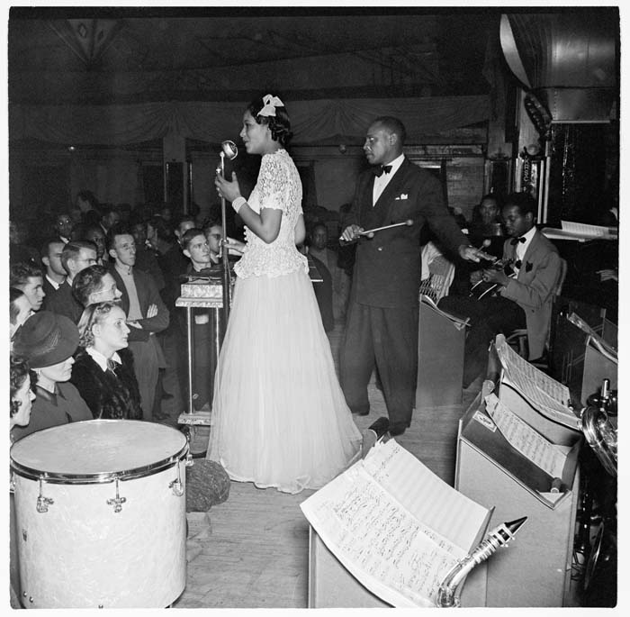 Image of Evelyn Williamson and Lionel Hampton onstage at the Trianon, December 1940