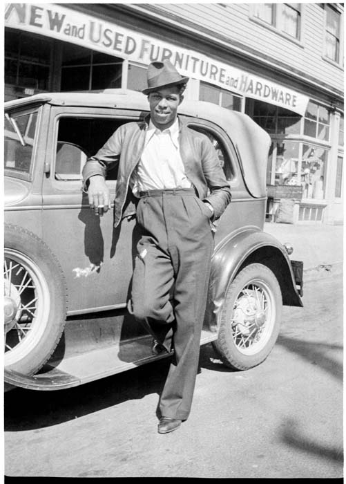 Image of Man leaning against car, Seattle, circa 1935