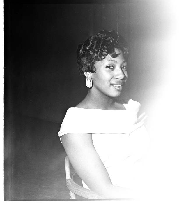 Image of Woman modeling a hairstyle, circa 1960