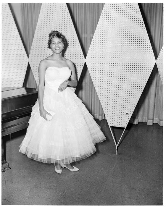 Image of Model posing at fashion show, Seattle, circa 1953
