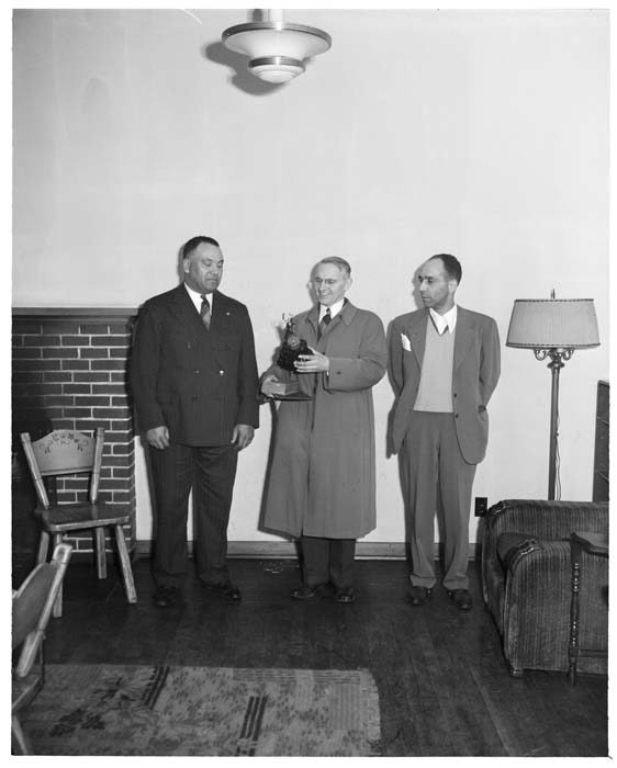 Image of Claude Norris, Royal Brougham, and  Bruce Rowell, Seattle, circa 1946