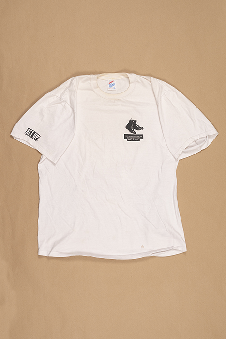 Image of ACT UP T-shirt with somber facts about AIDS on the back, owned by Philip Bereano, co-founder of ACT UP Seattle, ca. 1990