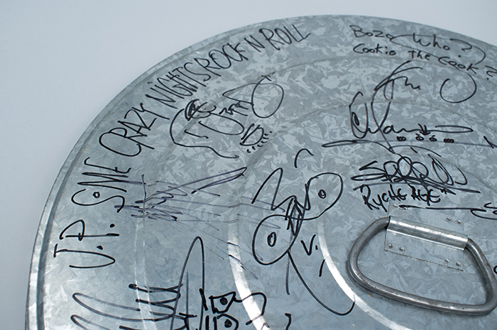 Image of Garbage can lid signed by the members of Queensrÿche, Soundgarden, Pearl Jam, and Alice in Chains, 1992