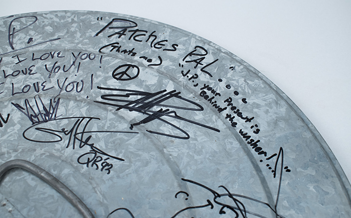Image of Garbage can lid signed by the members of Queensrÿche, Soundgarden, Pearl Jam, and Alice in Chains, 1992