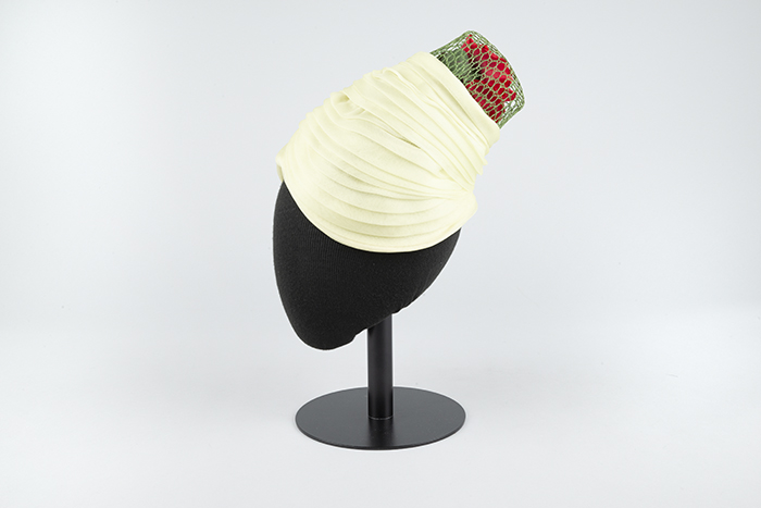 Image of Light green hat with flower in plastic cage from John Eaton, 1960s