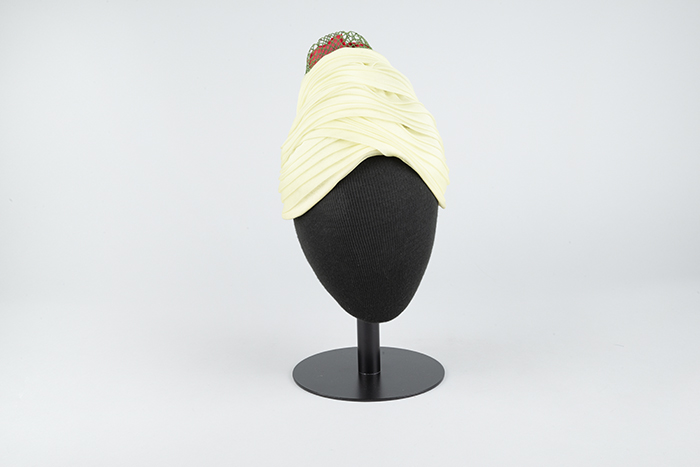 Image of Light green hat with flower in plastic cage from John Eaton, 1960s