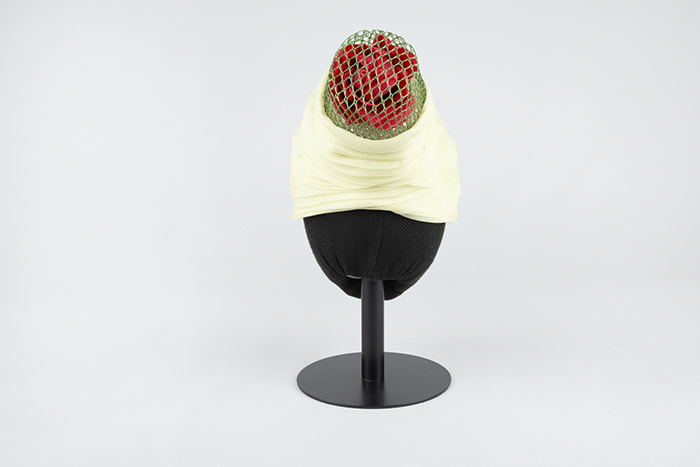 Image of Light green hat with flower in plastic cage from John Eaton, 1960s