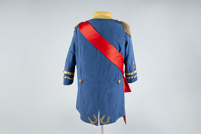 Image of Court uniform with sash and pins, worn by Paul Bigley, ca. 1980s-2010s