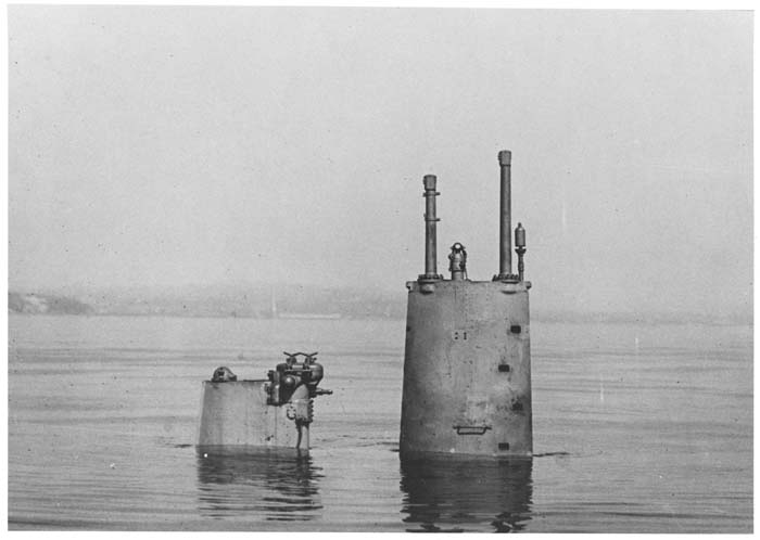 Image of USS N.1 Top of submarine emerging from water,  Seattle Construction & Dry Dock Co., circa 1917