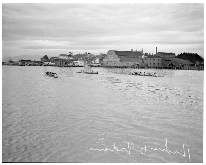Image of Indigenous canoes and Husky crew shell racing, La Conner, November 29, 1941
