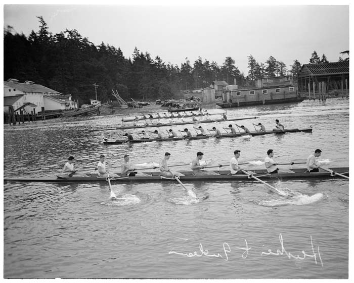 Image of Husky crew and Indigenous canoe race, La Conner, November 29, 1941