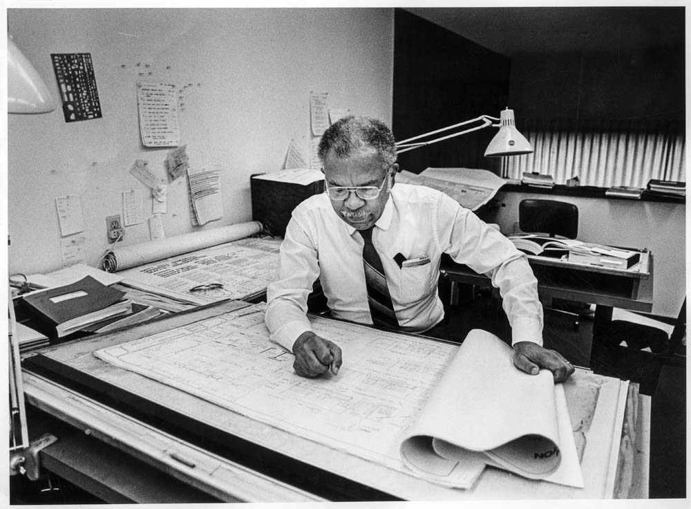 Image of Benjamin McAdoo working in his architectural offices, Seattle, 1981