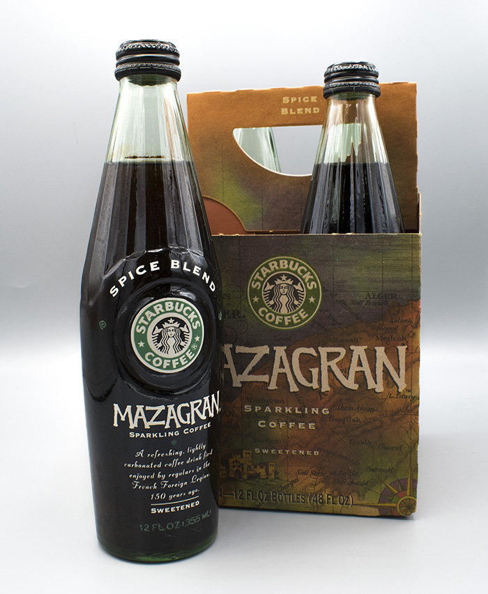 Image of Cardboard carrier with 4 bottles of Starbucks 