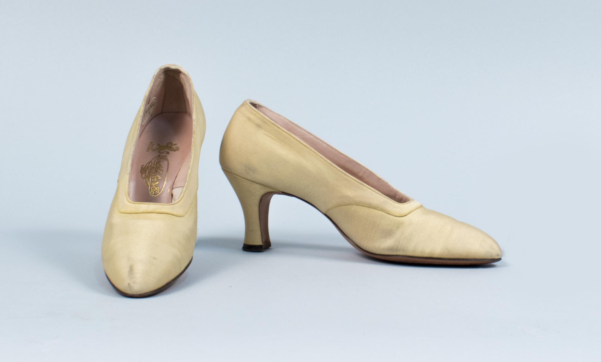 Image of Pale yellow silk slippers, ca. 1929