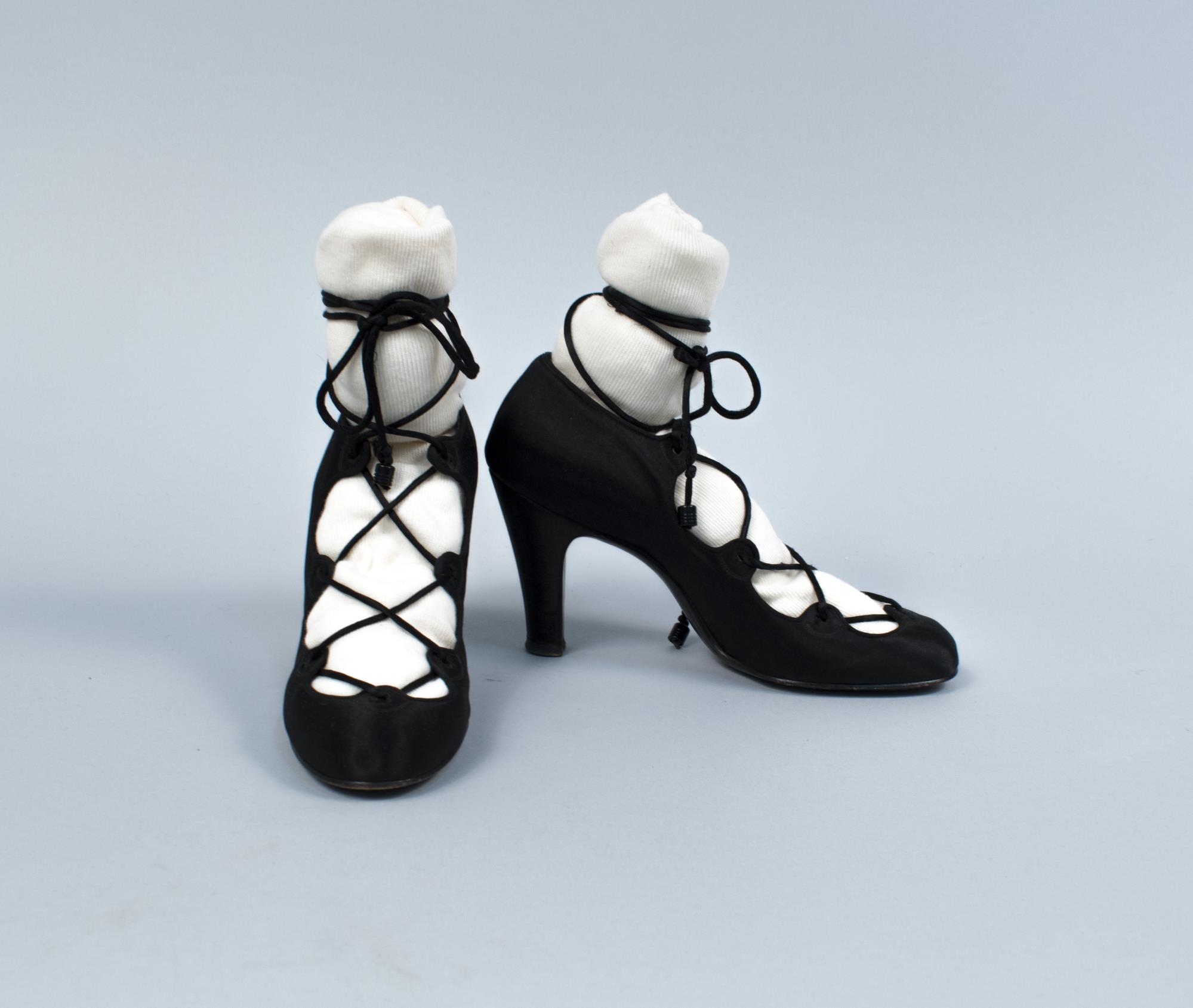 Image of Black satin pumps with satin laces, ca. 1930-1940