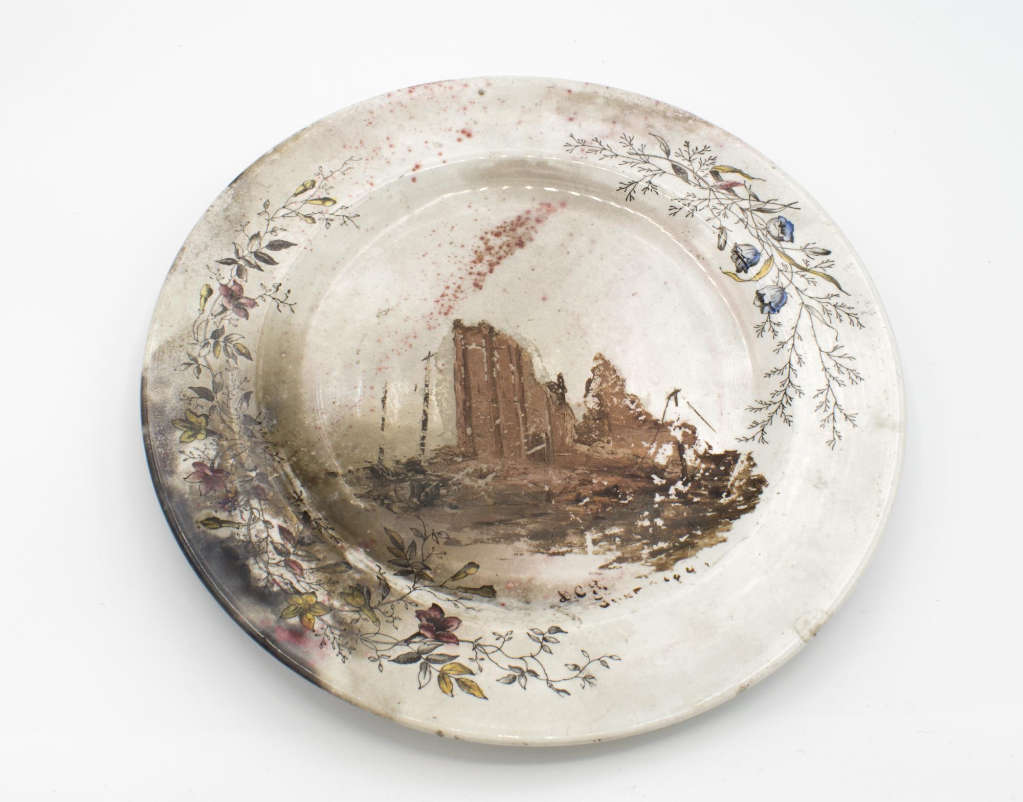 Image of China plate and cup that were in the Seattle Fire of 1889