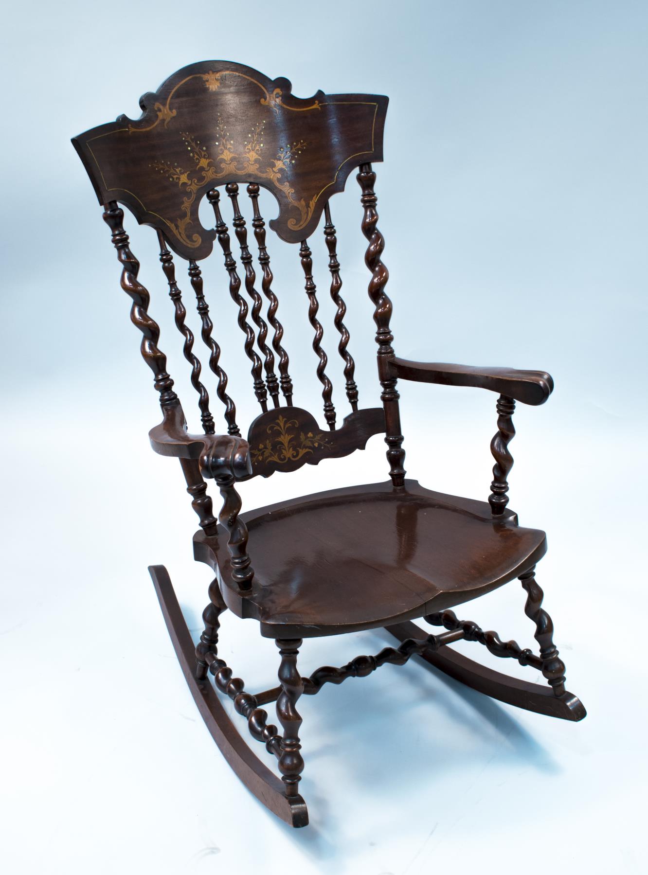 Image of Mahogany rocking chair from Standard Furniture Co. in Seattle, 1890